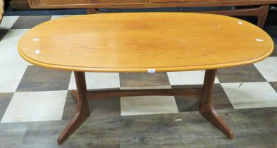 Late 20th Century Teak Oval topped coffee table with delta shaped supports… H:18 x W:42 x D:22 Inche