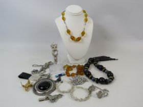 Various costume jewellery and a sterling silver Royal artillary enamel badge.