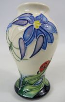 Small Moorcroft vase in the fly away home pattern, 10cm tall.