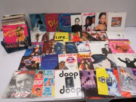 Approx 100 1990's Vinyl Singles. See photos.