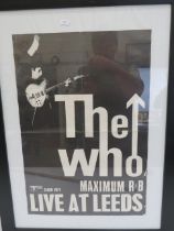 Printed poster of The Who. Framed and mounted under perspex which measures 22 x 30 Inches. (Fold mar