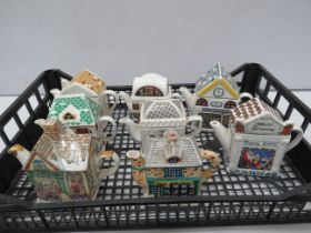 Selection of novelty teapots by Wade and Sadler.