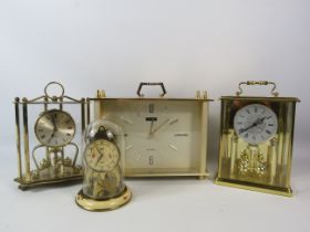 Selection of various mantle and carriage clocks, quartz and mechanical.