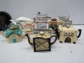 Selection of Novelty teapots by Tony wood and Annie Rowe including the Woolpack and the Queen Vic.