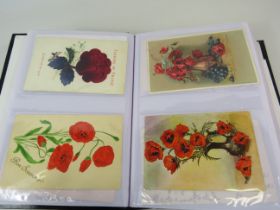 105 Poppy related postcards in a album some which are embroided.
