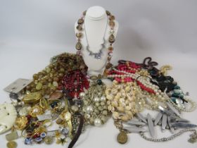 Selection of various vintage and modern costume jewellery and ladies quartz wristwatches.