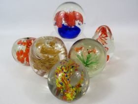 6 Art glass paperweights including one by Alum Bay.