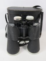 Pair of German made 20 x 60 Binoculars with hard carry case. See photos.