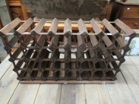 Well made wood and metal wine rack which measures 16 x 20 x 9 Inches. See photos. S2