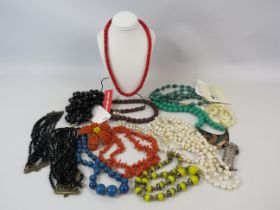 Mixed costume jewellery lot including Coral Necklace and freshwater pearls.