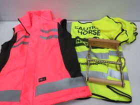 Horse riding Hi Vis jackets and a horse bit toilet roll holder.