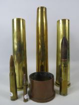 Selection of Ww2 Trench art brass shell cases and rounds.