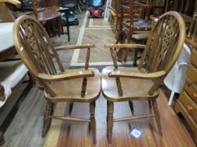 Pair of nicely made wheelbacked chairs with turned supports. See photos. S2
