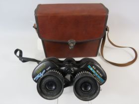 Pair of Tasco 8-16x40 binoculars with case.