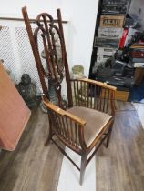 Pretty Art Nouveau inspired high backed stick chair with turned details.