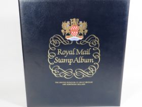 Royal Mail Stamp album containing over 100 pages of Mint GB Stamps. See photos