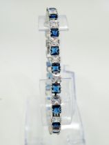 925 Silver Bracelet with Set Sapphire coloured gemstones. 8 inches long with extender link in unused