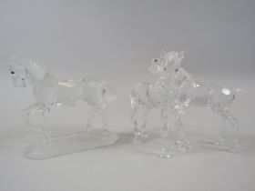 2 Swarovski Figurines Arabian Stallion and 2 Foals. The tallest measures 9cm.