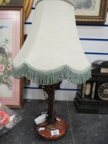 Woodend table lamp with spiral stem and bird motif, with shade.