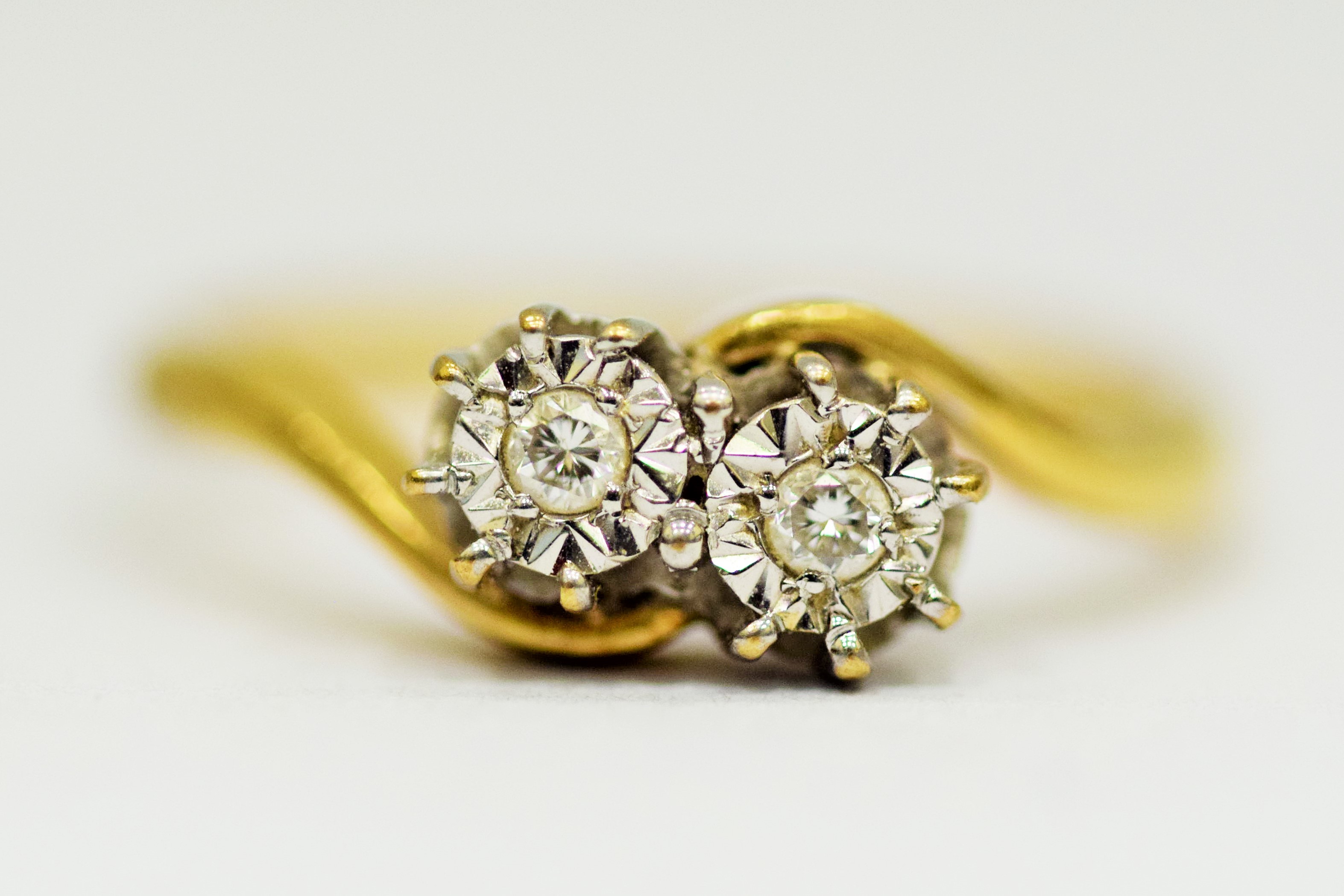 9ct Yellow Gold ring set with Twin Illusion set Diamonds of 0.05pts each.  Finger size 'O'   2.5g