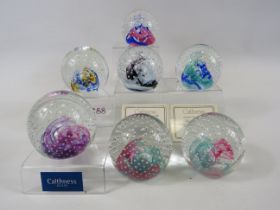 7 Caithness Reflections paperweights.