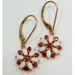 Pair of 9ct Gold Pearl and Ruby set earrings in a flower pattern. Each 25mm drop. Total weight 2.0g