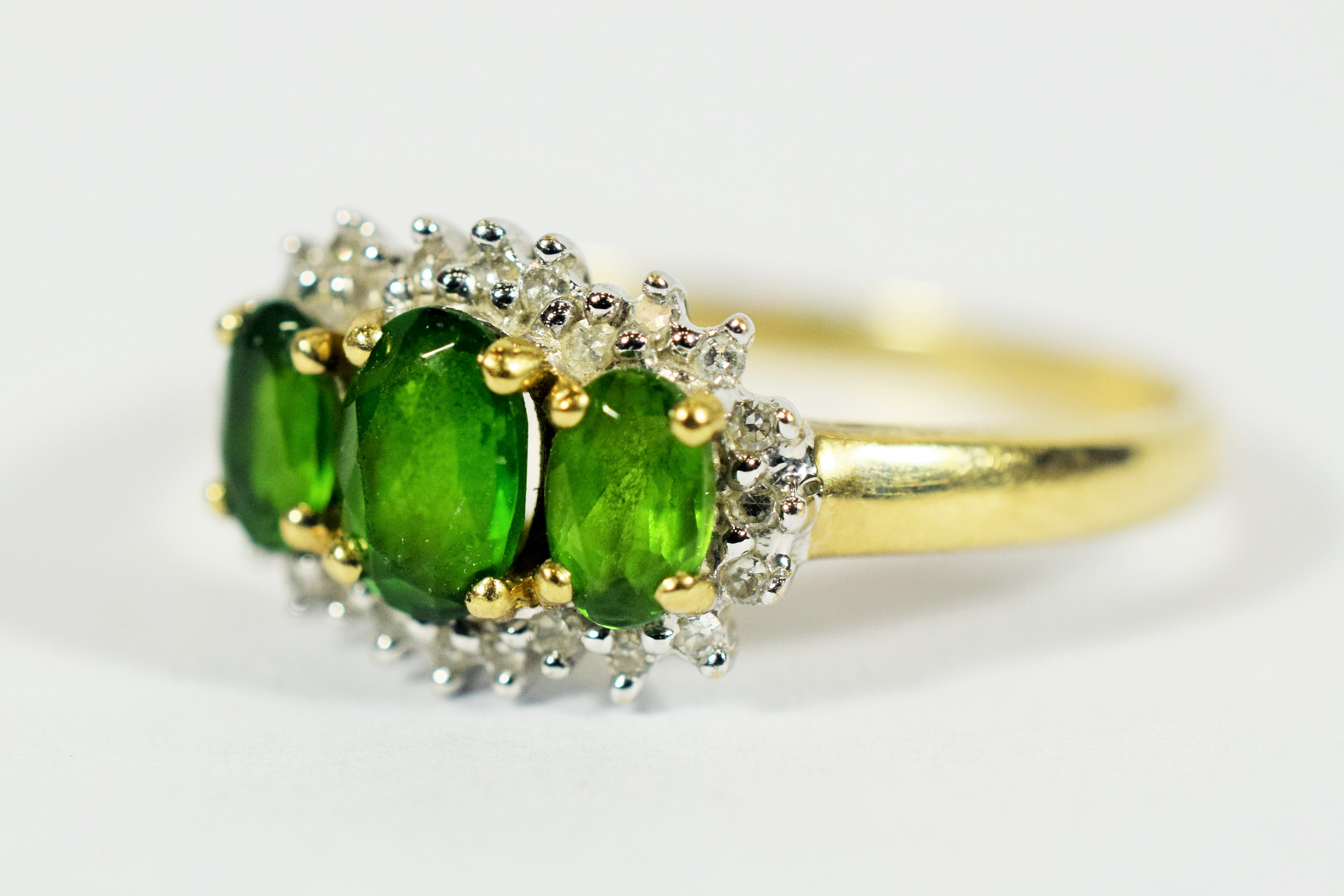9ct Yellow Gold Ring set with Three Central Emeralds with Diamond Surround..   Finger size 'Q-5 to R - Image 3 of 3