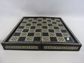 Egyptian folding Chess/backgammon board lacquered with mother of pearl inlay.