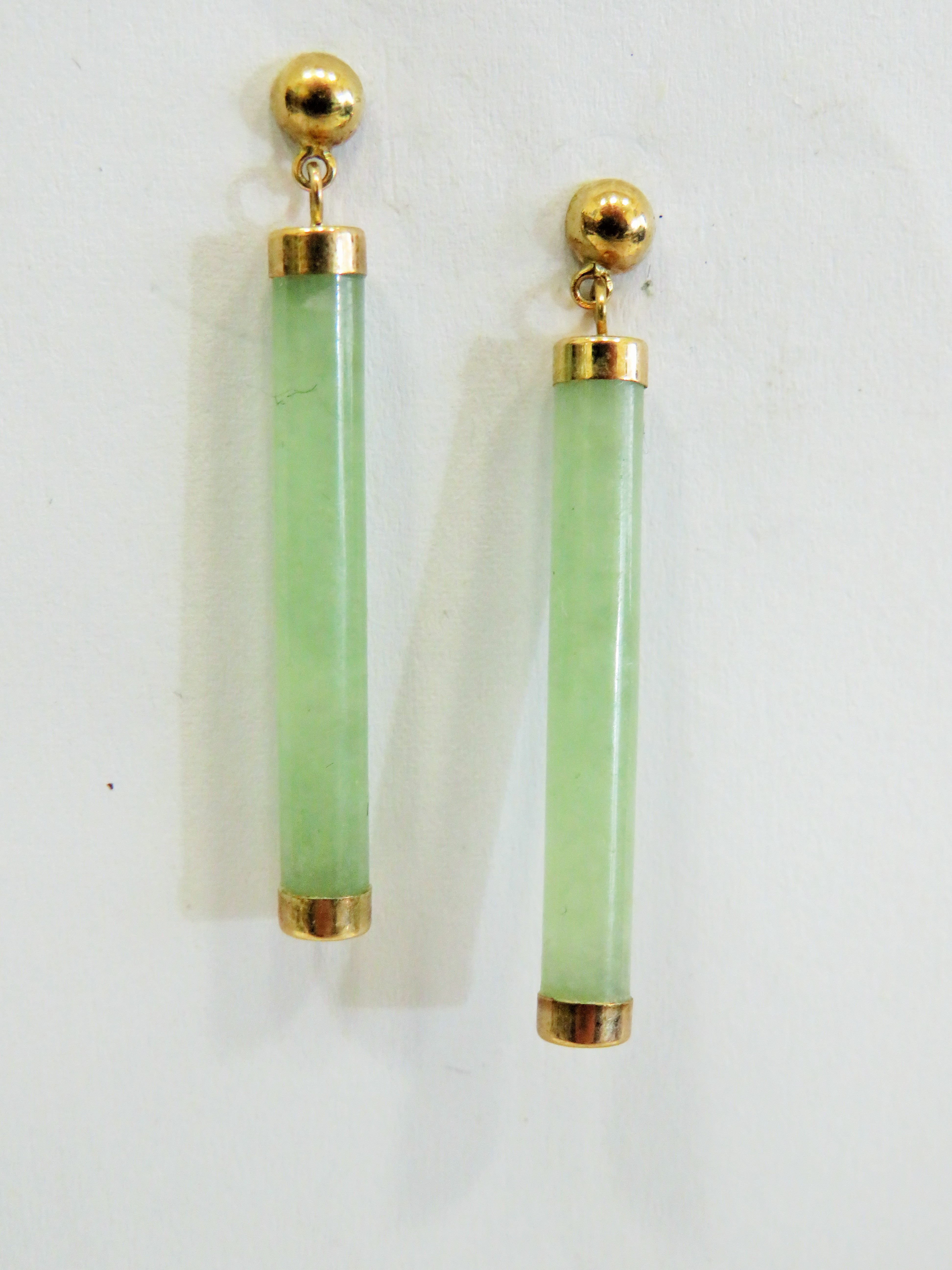 Pair of 30mm long Jade Cylinder Earrings set with 9ct Yellow Gold mounts and fasteners.  See photos.