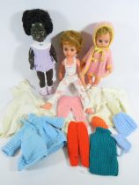 Selection of Vintage Dolls and clothing. See photos.