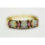 9ct Yellow Gold Ring set with Opal & Amethysts. Finger size 'Q-5 to R' 2.4 g