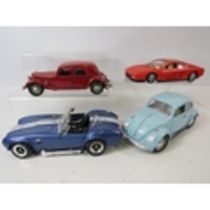 Selection of Larger Die Cast models by Burago and Road Tough. No boxes. See photos. PA1678