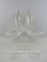 2 Royal Doulton large champagne glasses and 4 large Waterford Jasper Conran glasses.