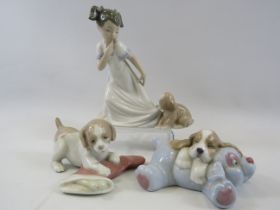 3 Nao figurines, girl with puppy and 2 puppies with toys.