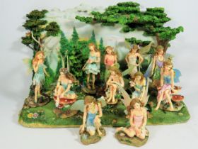 Faerie Glenn Diorama Backdrop plus 11 Faerie glen sitting and standing figurers . All in excellent c