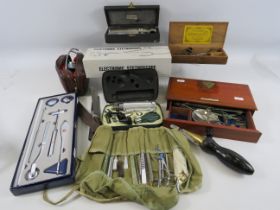 2 sets of vintage Apothecary scales and a selection of vintage medical instruments.