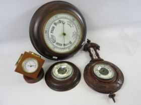 2 Barometers and 2 Barometer/thermometers (2 require repair to glass).