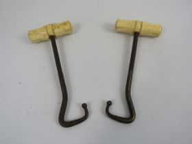 Pair of antique bone handle boot pulls.