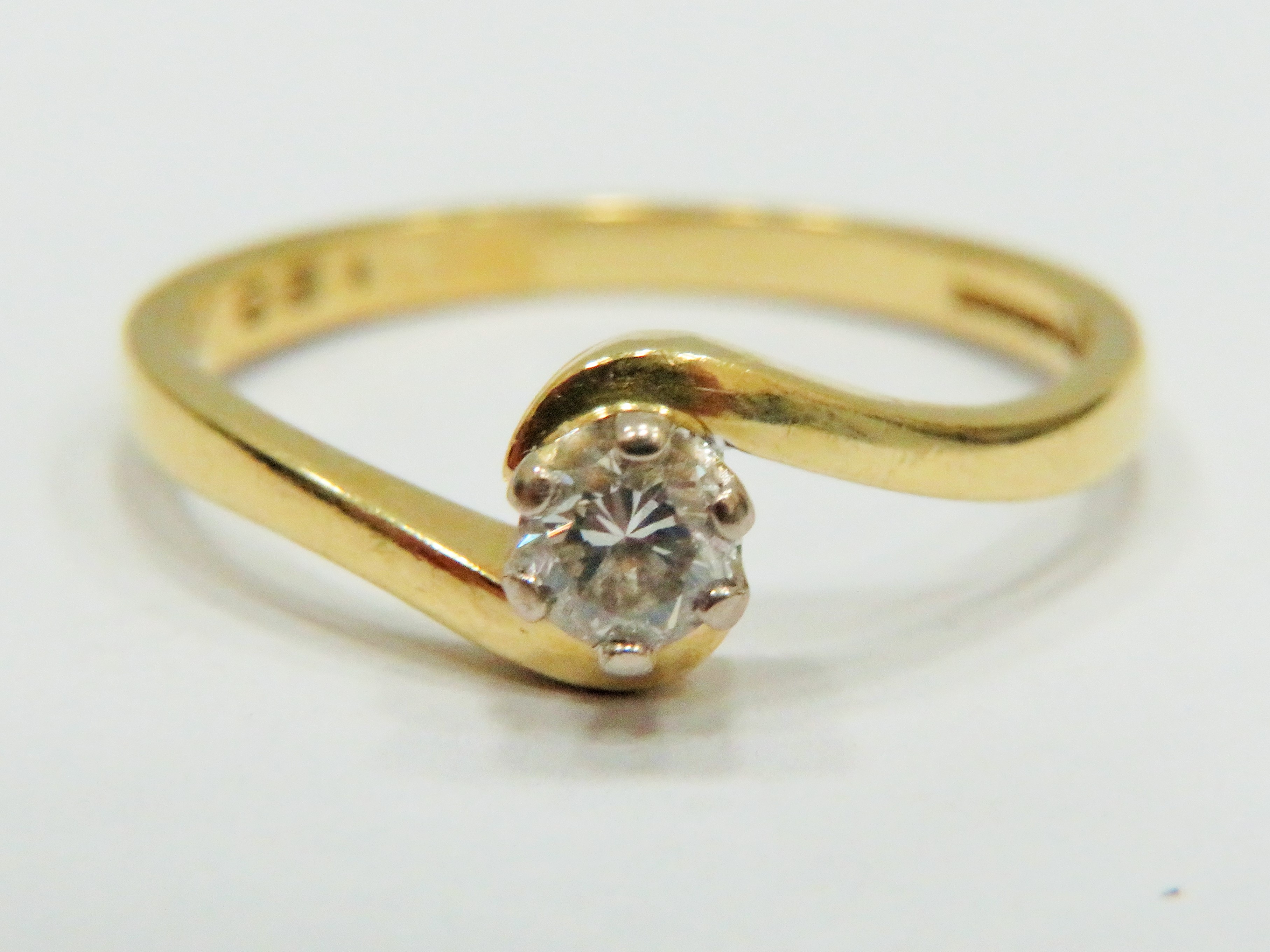 18ct Yellow Gold ring set with a Diamond Solitaire of approx 0.25pts.  Finger size 'P-5'  3.1g