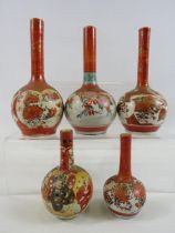 6 small Japanese bud vases with character marks to the base, the tallest measures 6" tall.