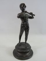 Cast copper bronze effect figurine of a piper.