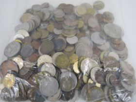 Over 3 kgs of mixed foreign coins.