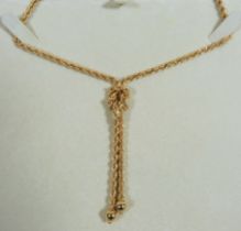 18ct Twist rope neck chain with knot style pendant woven in. Overall length 22 inches. Total weigh