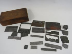 Selection of vintage metal advertising blocks.