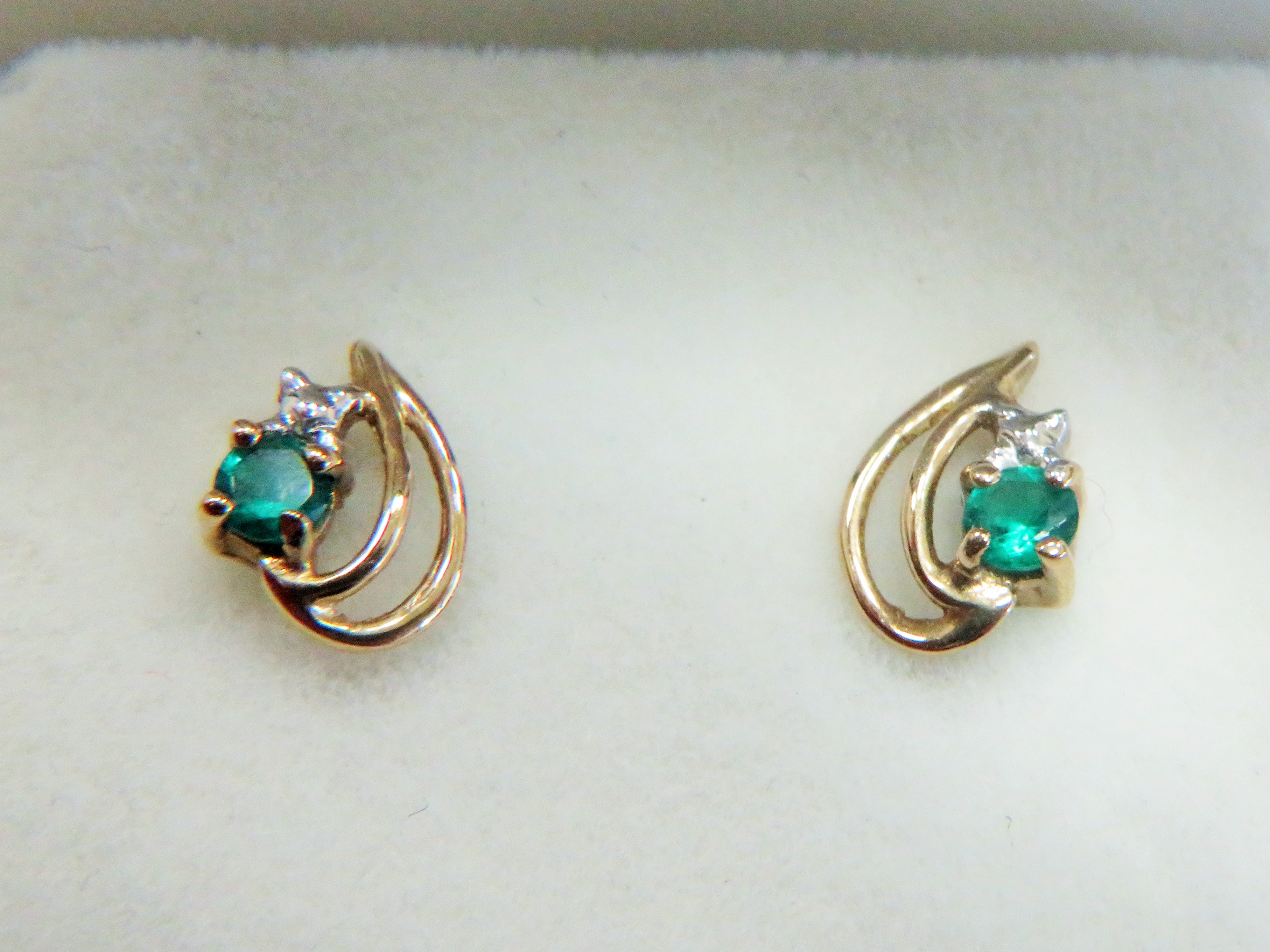 Pair of 9ct Yellow Gold double loop ear studs,  each set with a small circular Emerald coloured CZ s