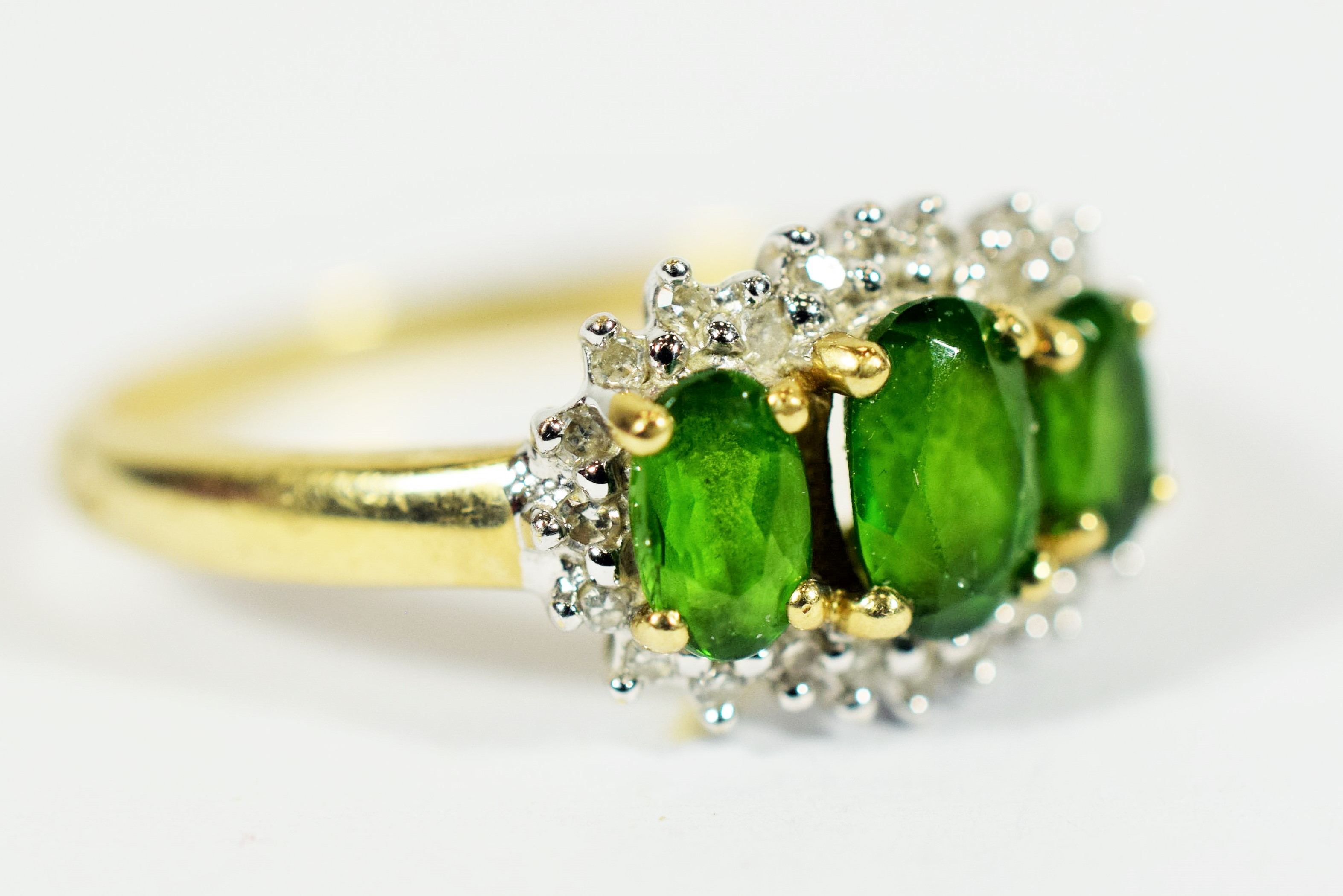 9ct Yellow Gold Ring set with Three Central Emeralds with Diamond Surround..   Finger size 'Q-5 to R - Image 2 of 3