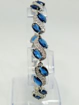 925 Silver Bracelet Set with Sapphire coloured gemstones. 8 inches long with extender link in unuse