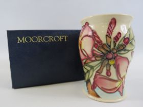 Moorcroft Frangipani vase with box, approx 5 1/4" tall.