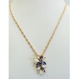 9ct Opal and Tanzanite set leaf pendant (25mm) set upon a 20 inch double link 9ct chain. Total weigh