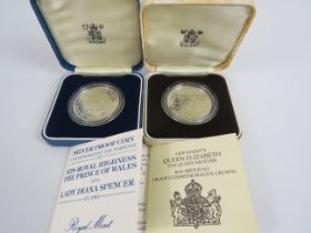 2 x Royal mint silver proof coins.
